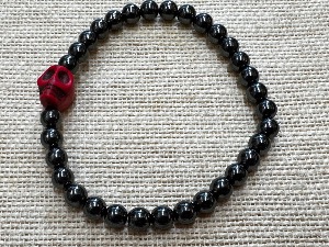 Hematite 6mm Beads with Magnesite Skull Bead - 20cm Elasticated Bracelet  (ref SHMB122863)